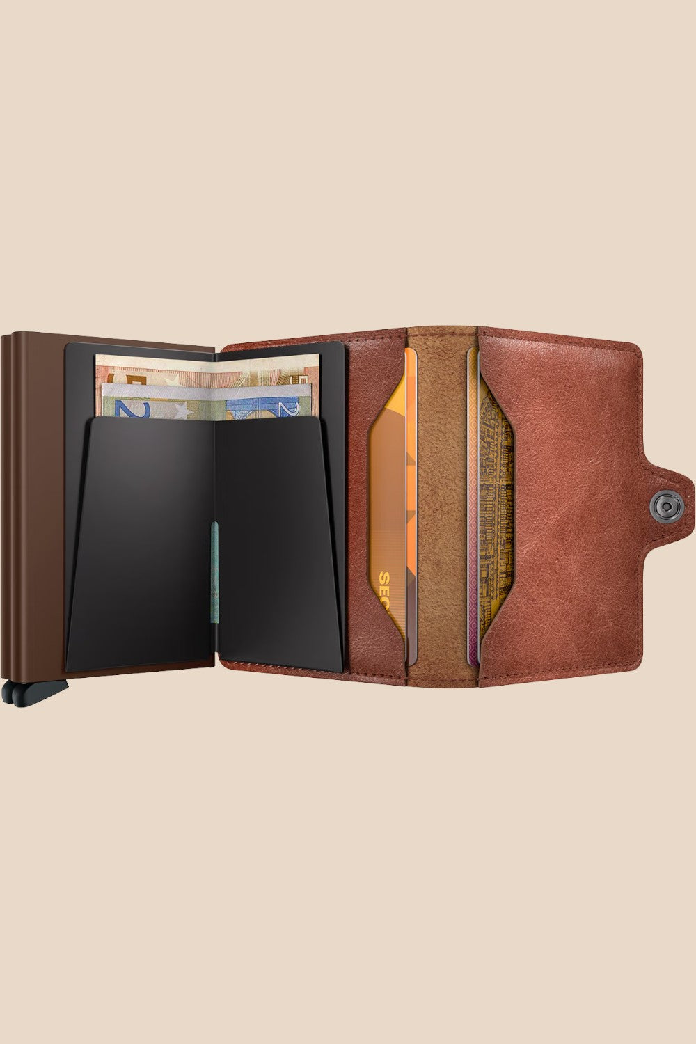 Broderick's Clothing Co. Secrid Twinwallet in vintage cognac-brown leather with two card protectors and snap closure.
