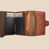 Broderick's Clothing Co. Secrid Twinwallet in vintage cognac-brown leather with two card protectors and snap closure.
