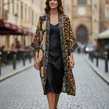 Broderick's Clothing Co. Shannon Passero Dylan kimono cardigan with leopard print and gold circular motifs on a model