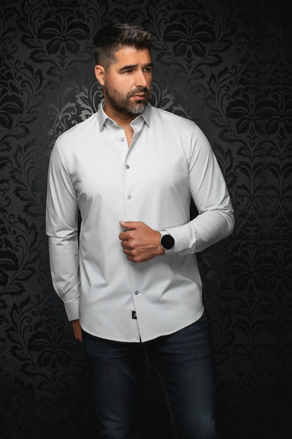 Broderick's Clothing Co. Au Noir Alexander silver knit long sleeve dress shirt worn by a man against a dark background