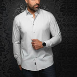 Broderick's Clothing Co. Au Noir Alexander silver knit long sleeve dress shirt worn by a man against a dark background