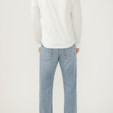 Broderick's Clothing Co. Silver Jeans Co. Machray slim straight light wash denim jeans worn by a man from behind.