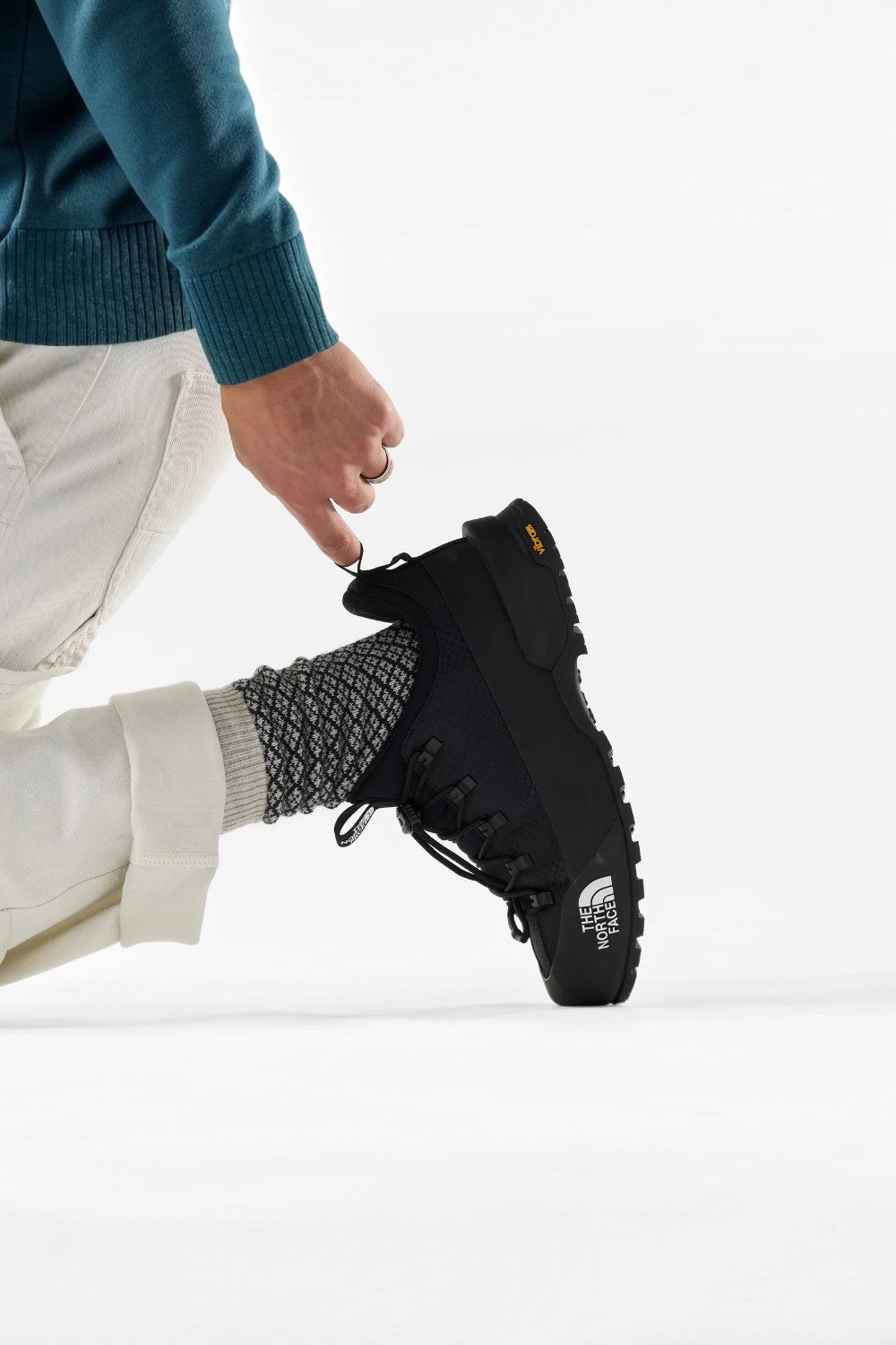 Broderick's Clothing Co. Smartwool Everyday Cozy Mercantile crew socks in a grey patterned knit worn with black boots