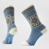 Broderick's Clothing Co. Smartwool women's blue and grey crew socks featuring a cozy popcorn snowflake pattern.
