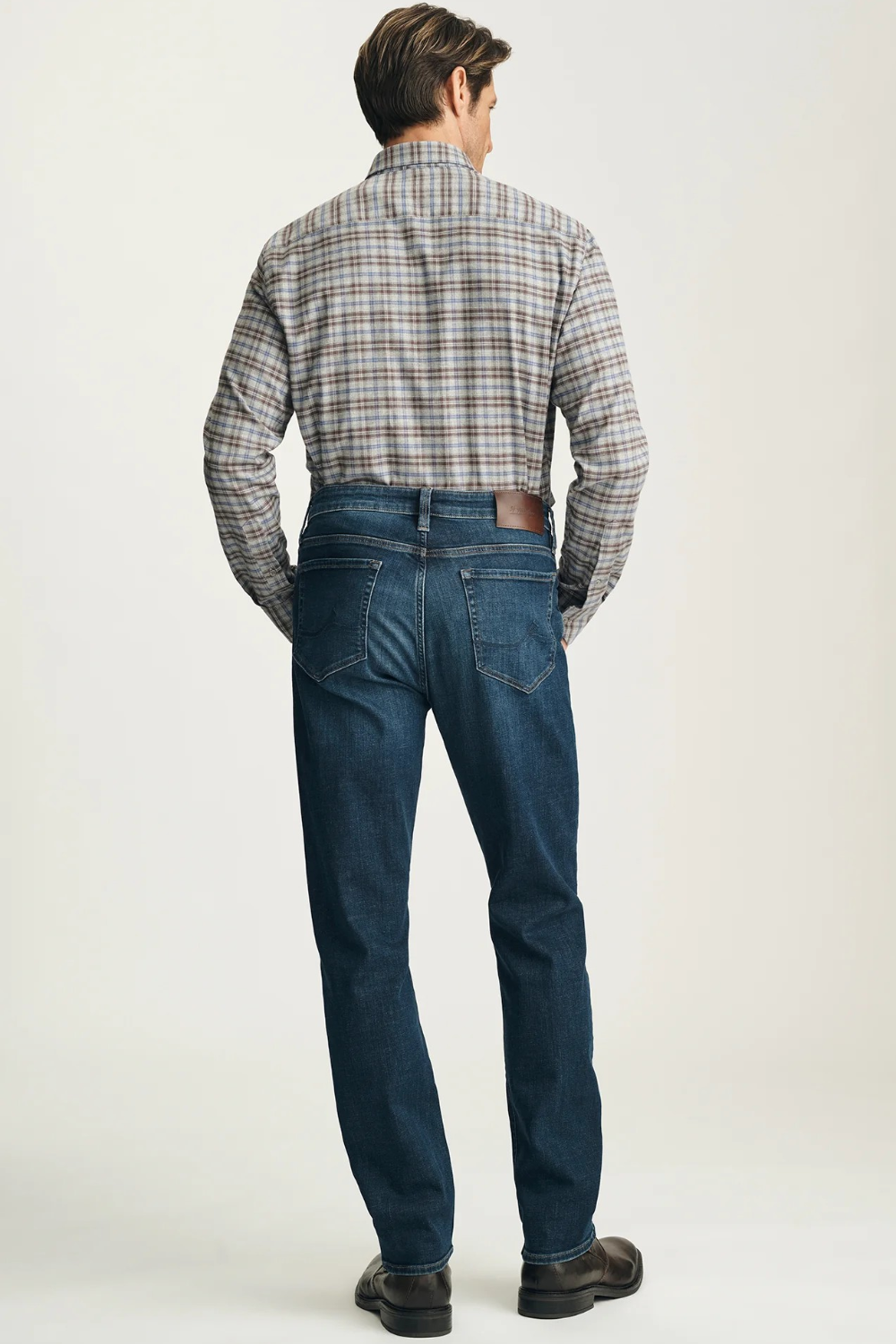Broderick's Clothing Co. 34 Heritage Courage dark vintage straight leg jeans worn by a man in a plaid shirt