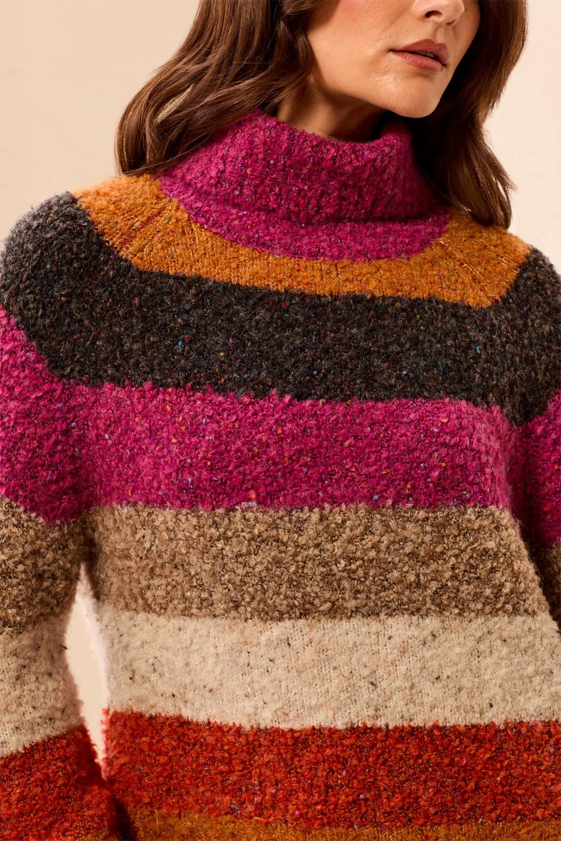 Broderick's Clothing Co. multi-colored striped bouclé turtleneck sweater with a plush, textured knit finish.