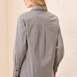 Broderick's Clothing Co. striped button-front shirt with long sleeves and wide cuffs, back view on a blonde model.