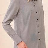 Broderick's Clothing Co. black and white striped stretch poplin button-front shirt with architectural side panels.
