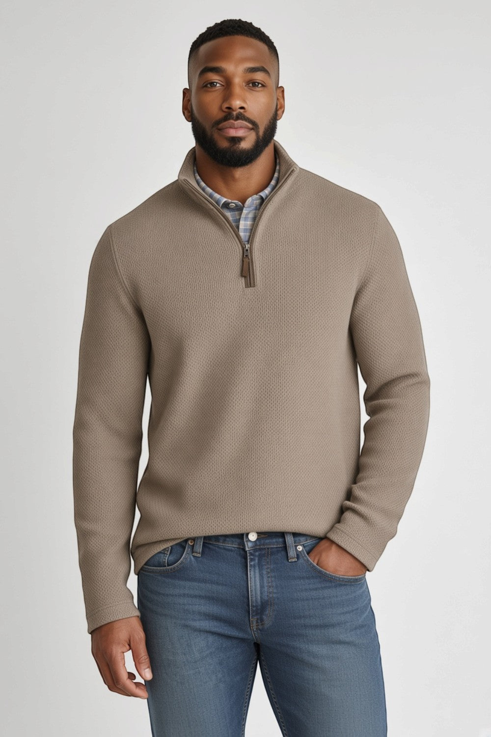 Broderick's Clothing Co. Johnston & Murphy tan melange quarter-zip sweater worn by a man over a plaid shirt.