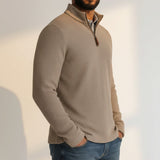 Broderick's Clothing Co. Johnston & Murphy tan melange quarter-zip sweater worn by a man with blue jeans