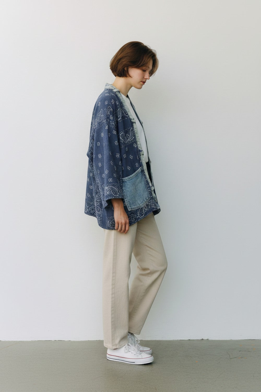 Broderick's Clothing Co. upcycled denim bandana short kimono with a relaxed fit worn by a model.