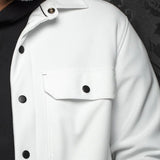 Broderick's Clothing Co. Au Noir GRADO white overshirt with black buttons and chest pocket worn over a black shirt