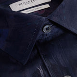 The Julian long-sleeved shirt is crafted from Comfort Stretch cotton and features a tonal floral print, a point collar, adjustable notched cuffs, and a curved hem.