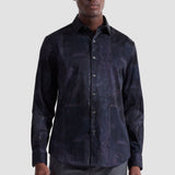 The Julian long-sleeved shirt is crafted from Comfort Stretch cotton and features a tonal floral print, a point collar, adjustable notched cuffs, and a curved hem.