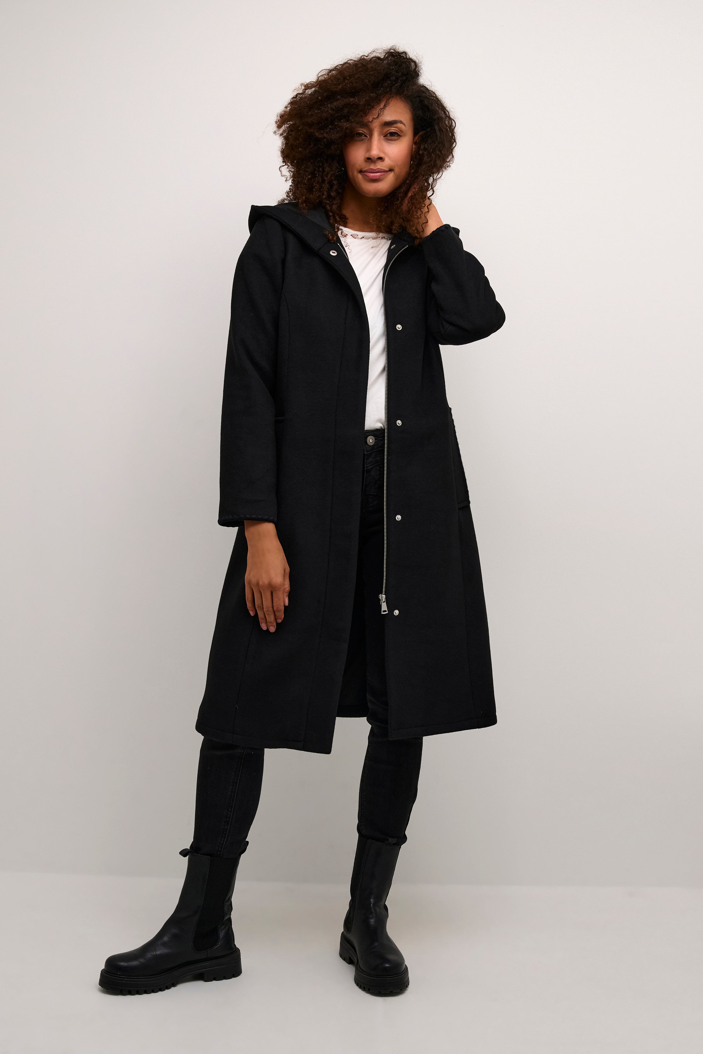 Be the epitome of style and sophistication with our Cream Claire Coat. Made with luxurious claire wool, this coat will keep you warm and fashionable. Elevate any outfit with its versatile design, perfect for any occasion. Embrace elegance and comfort with our Claire Coat.