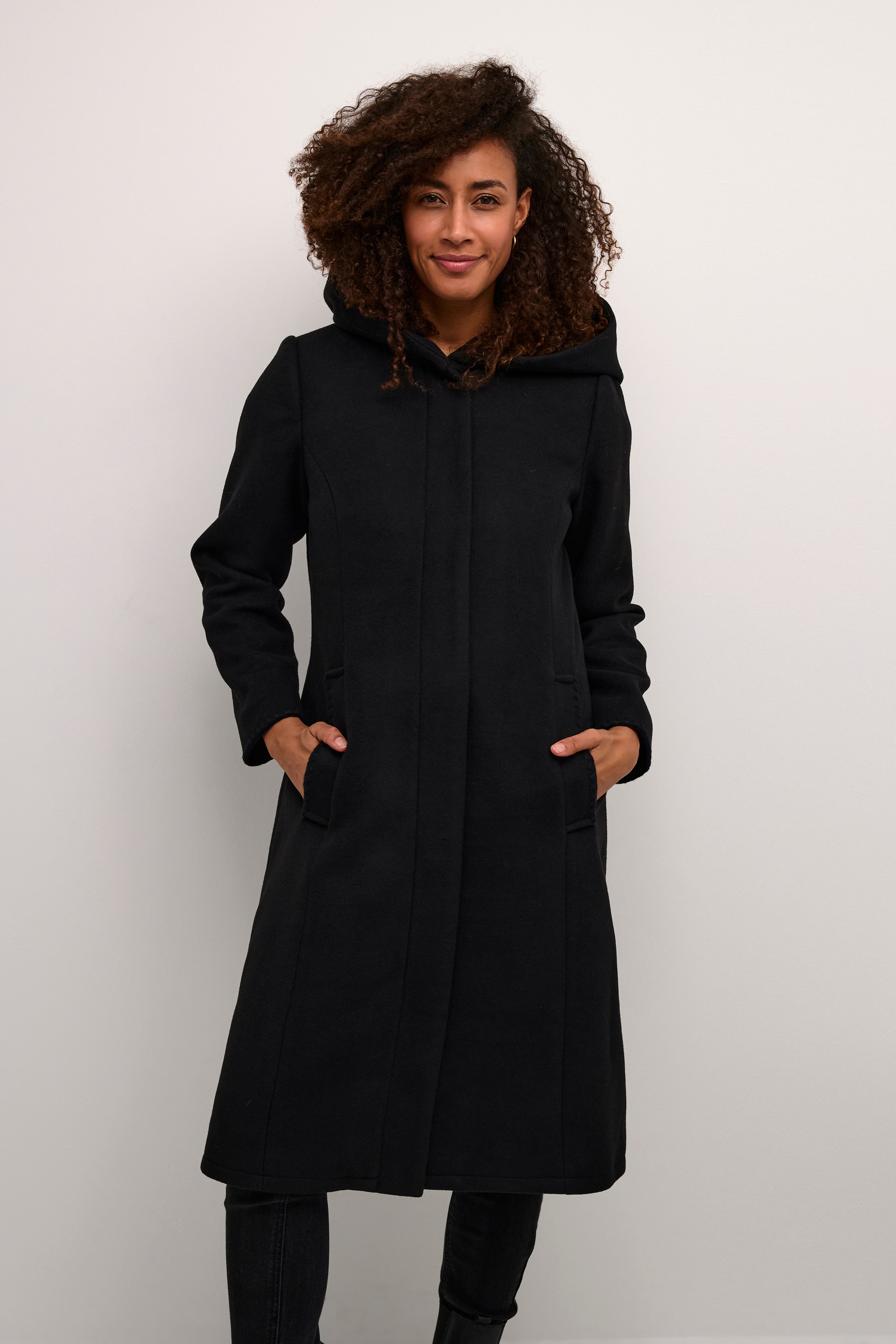Be the epitome of style and sophistication with our Cream Claire Coat. Made with luxurious claire wool, this coat will keep you warm and fashionable. Elevate any outfit with its versatile design, perfect for any occasion. Embrace elegance and comfort with our Claire Coat.