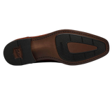 The Florsheim Sorrento Plain Toe Single Monk Strap features a rich leather upper with an elegant buckle and a sleek silhouette. The convenience of a slip on is further enhanced by the comfort of its fully cushioned leather covered footbed and soft leather linings.