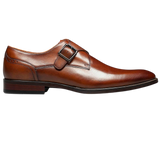 The Florsheim Sorrento Plain Toe Single Monk Strap features a rich leather upper with an elegant buckle and a sleek silhouette. The convenience of a slip on is further enhanced by the comfort of its fully cushioned leather covered footbed and soft leather linings.