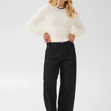 Broderick's Clothing Co. cream long-sleeve knit pullover with a round neckline and subtle textured surface detail.