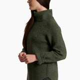 Woman wearing a green ribbed sweater on a white background