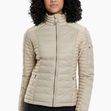 The remarkable SPYFIRE Down Jacket is lighter, softer, and stronger. One look and you’ll know it’s different. Features more down at your core and less under your arms and high sweat zones where you need the freedom to move. Temperature-regulating knit underarm gussets release excess heat for sustained comfort during high-output activity. Reinforced overlays provide durability while our 3D patterning supplies the ideal feminine fit.&nbsp;