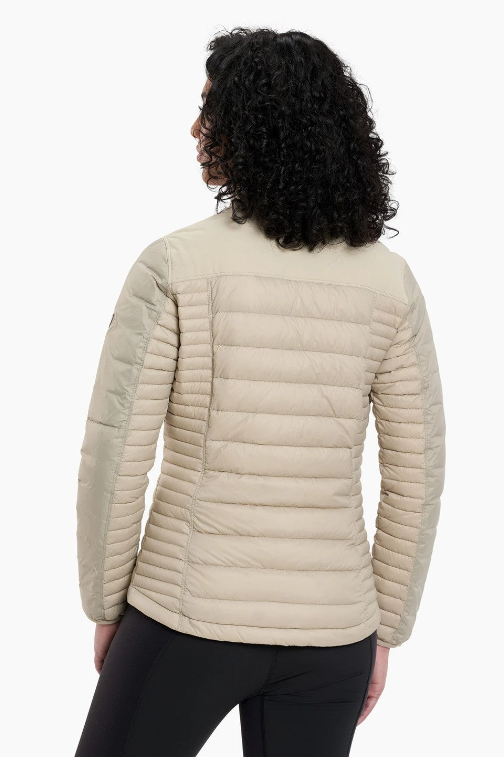 The remarkable SPYFIRE Down Jacket is lighter, softer, and stronger. One look and you’ll know it’s different. Features more down at your core and less under your arms and high sweat zones where you need the freedom to move. Temperature-regulating knit underarm gussets release excess heat for sustained comfort during high-output activity. Reinforced overlays provide durability while our 3D patterning supplies the ideal feminine fit.&nbsp;