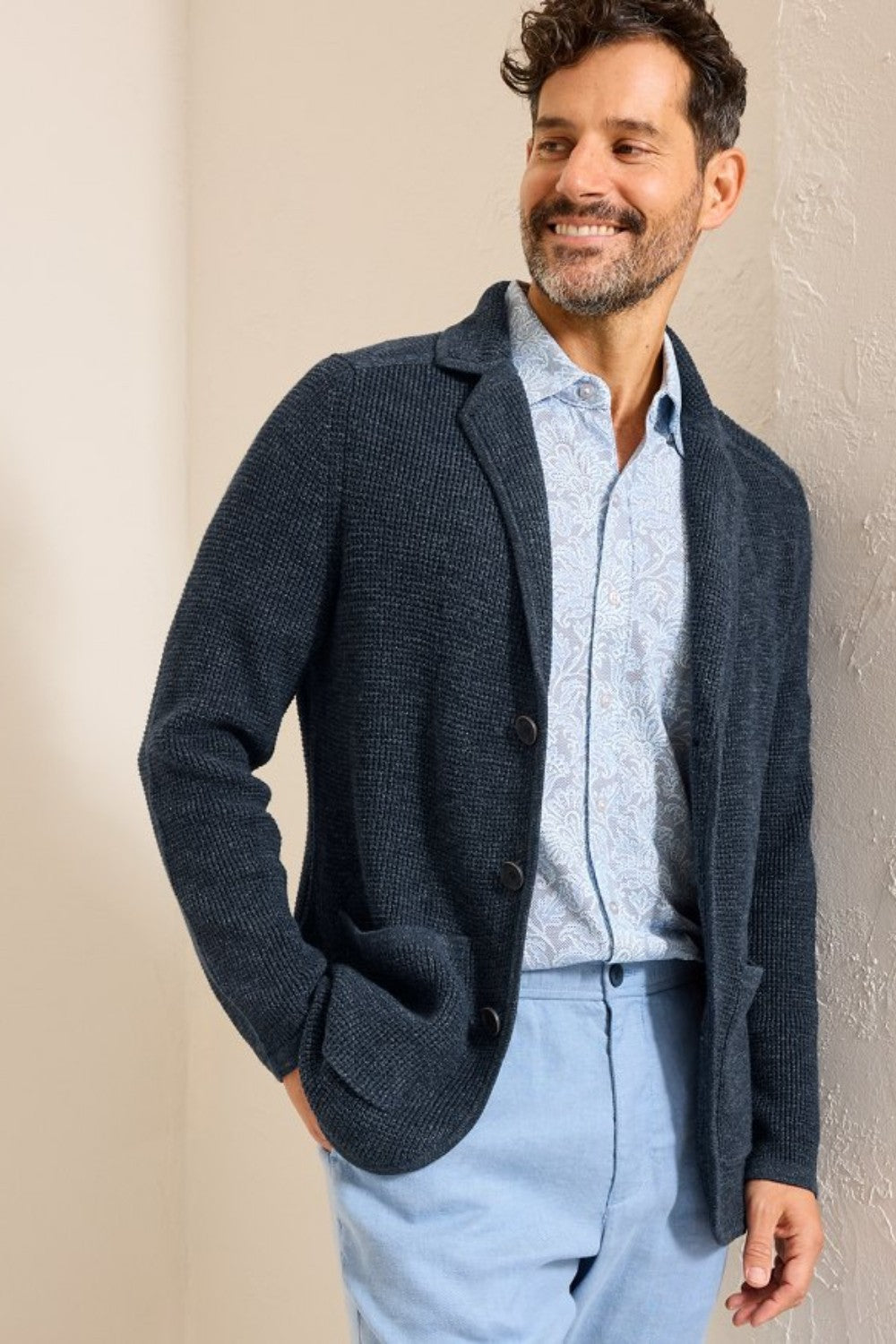 Say no to stuffy suiting and embrace the exceptional comfort of this knit blazer, crafted from a supremely soft cotton blend.