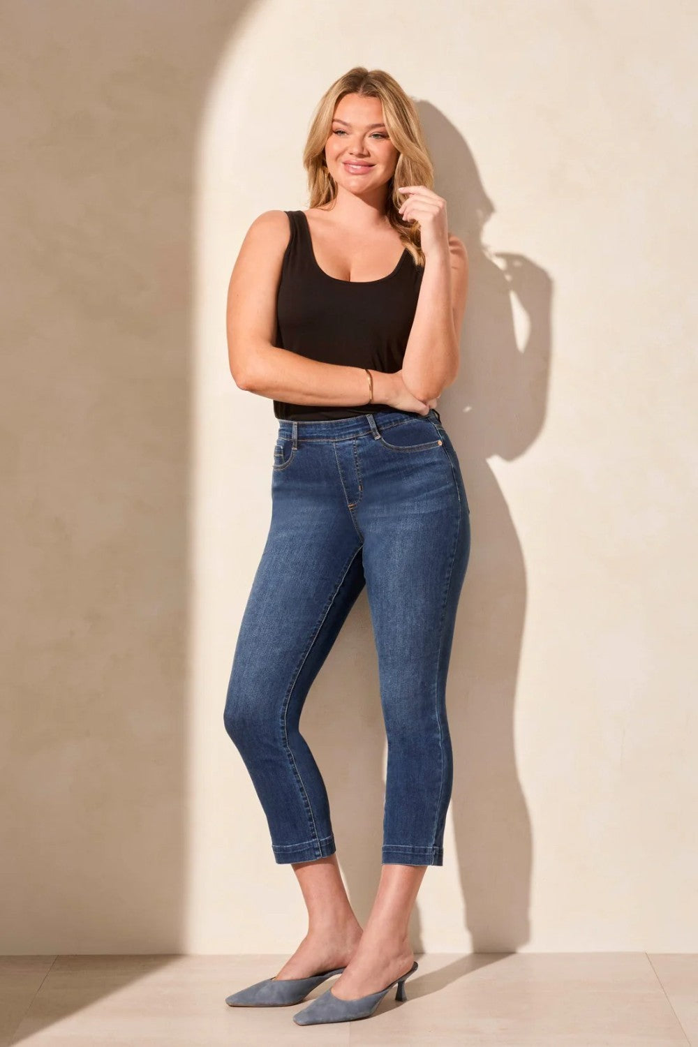 Infuse your day with casual comfort in these mid-rise jeans, crafted from stretch denim. The straight-leg cut features an elegant crease detail along the leg for a poised finish, while the well-placed pockets offer practicality without compromising style.