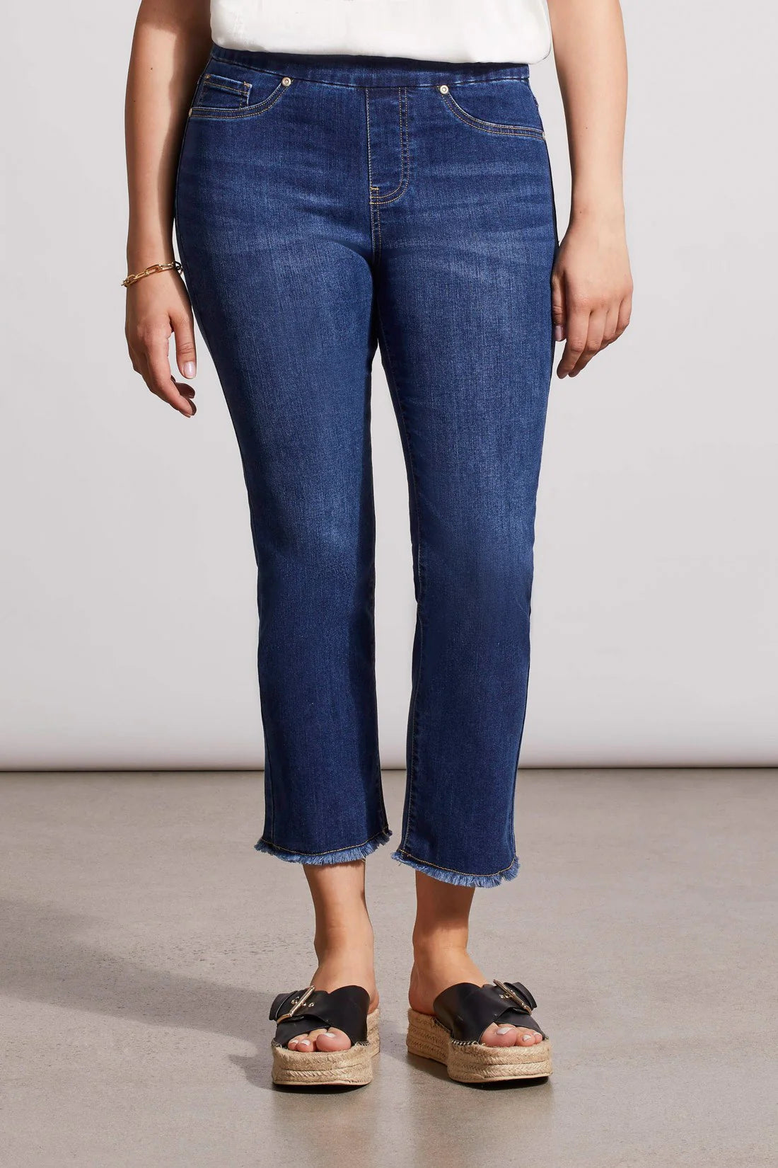 The thoughtfully designed jean is slim-fitting through the hip, butt and thigh with a straight leg.