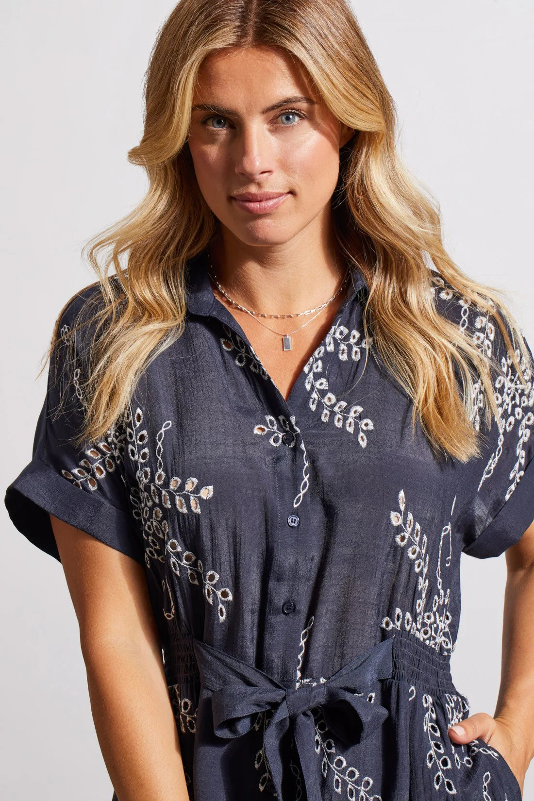 Intricated English embroidery adds a chic touch to this button-up shirt dress. A matching belt lets you adjust the fit, short kimono sleeves complete the look, and side seam pockets add a functional detail.