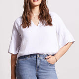 Crafted from crinkled gauze cotton, this blouse brings a lightweight feel and refined look to your regular rotation.