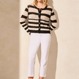 Top your ensemble with this cozy button-front cardigan showcasing a statement stripe pattern. The boxy fit keeps it comfortable as you layer it over your look, and long sleeves keep you covered.