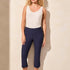 Step out into the sunshine in these classic capri pants, designed with a flattering slim leg fit and Flatten It® Technology to enhance your silhouette. The pull-on style allows for quick and easy dressing, while the stretch twill fabric provides all-day comfort. A rounded side slit adds a stylish accent to the hem.