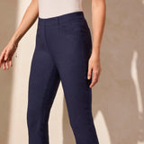 Step out into the sunshine in these classic capri pants, designed with a flattering slim leg fit and Flatten It® Technology to enhance your silhouette. The pull-on style allows for quick and easy dressing, while the stretch twill fabric provides all-day comfort. A rounded side slit adds a stylish accent to the hem.