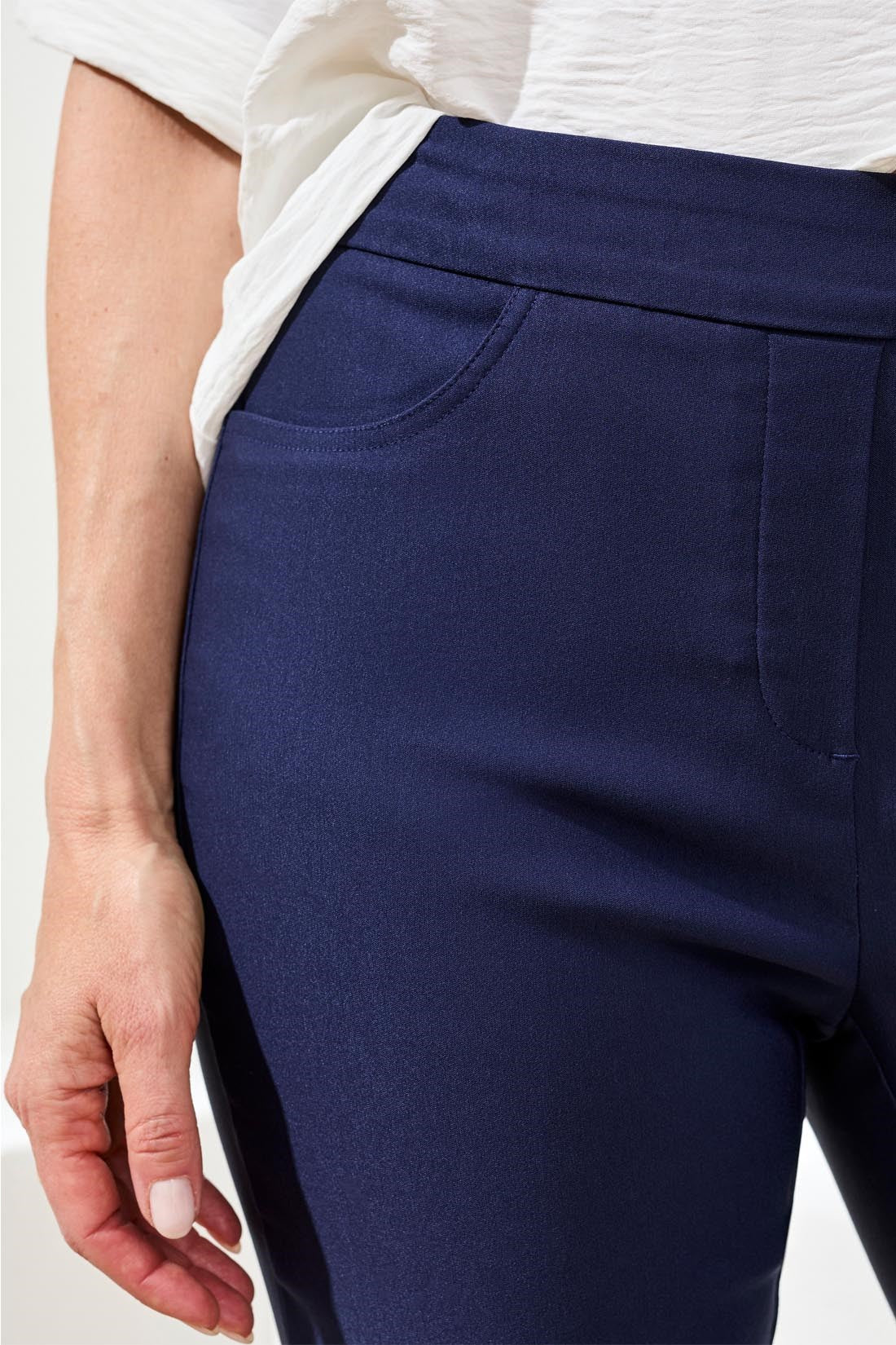 Close up of navy pant waist detail