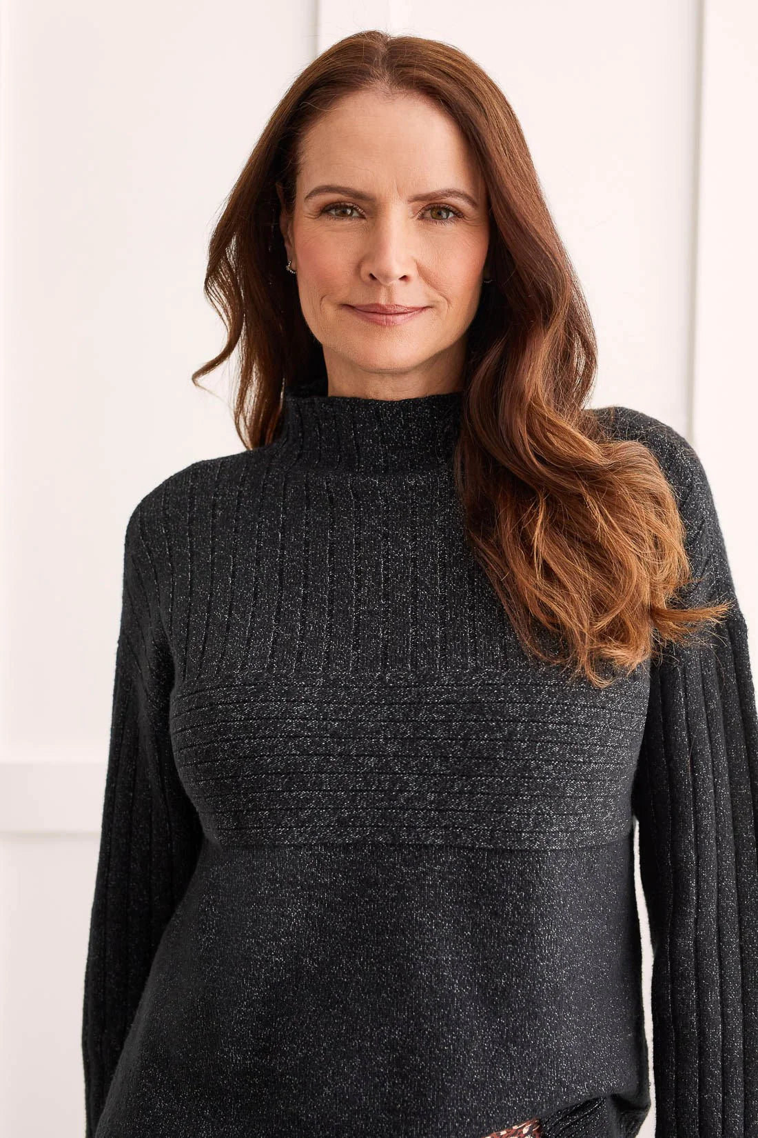 Make friends with a funnel neck sweater this season and it'll never let you down! We're falling hard for this pretty poly-blend piece that feels ultra-soft from the moment you slip it on.