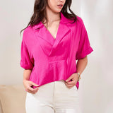 A soft lapel collar frames the V neckline of this drapey Airflow Woven top, creating an effortlessly refined look for any occasion. Lightweight and breathable, it delivers easy comfort with a flowy silhouette and relaxed short sleeves, perfect for warm sunny days.