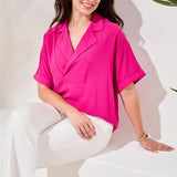 A soft lapel collar frames the V neckline of this drapey Airflow Woven top, creating an effortlessly refined look for any occasion. Lightweight and breathable, it delivers easy comfort with a flowy silhouette and relaxed short sleeves, perfect for warm sunny days.