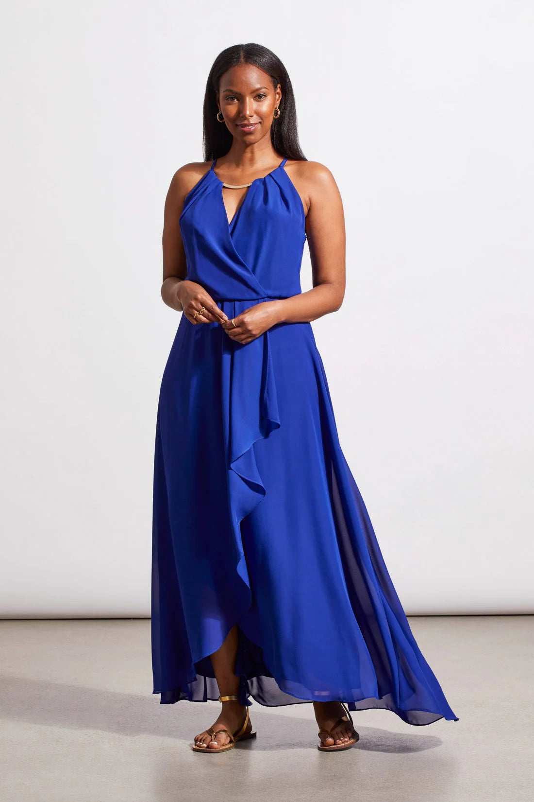  Cut from floaty chiffon fabric, this maxi dress will leave you feeling light as a cloud. We can't get enough of the keyhole neckline that transitions into a surplice bodice, the solid color, sleeveless construction, lined interior, and floor-length silhouette.