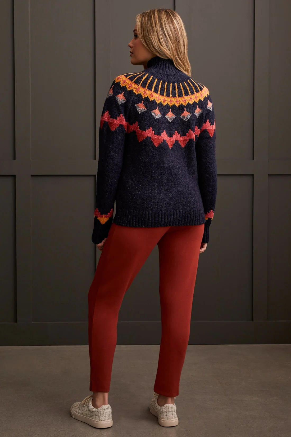 Embrace bold fashion with confidence in this mock neck sweater, featuring vibrant geometric intarsia patterning that adds a pop of colour to chilly days. Designed with a chic pop-over style, long sleeves, and crafted from novelty yarn, it wraps you up in comfort while making a statement with every wear.