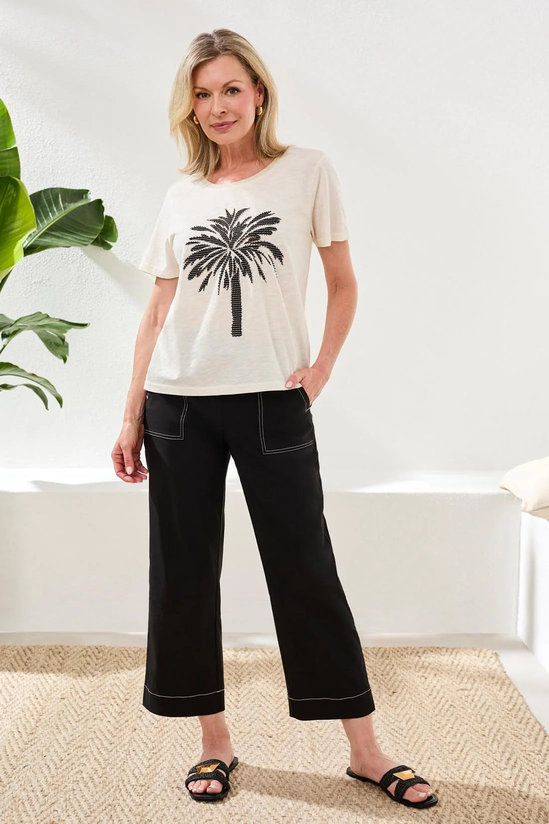 A bold palm placement print makes this crewneck tee a true standout. Crafted in slub cotton for breathable softness, it’s a fresh pop of artistry for your everyday style, finished with a classic fit.