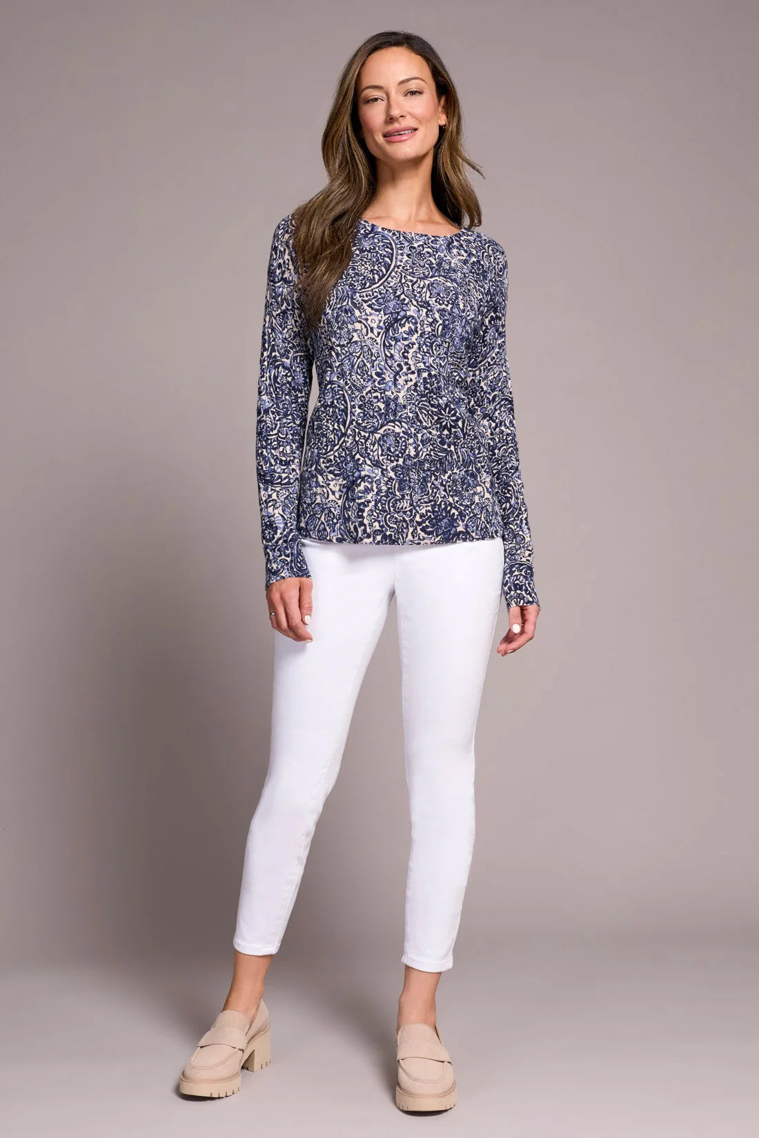 Wrap yourself in effortless warmth and style with this striking sweater, featuring a bold, eye-catching print. Crafted from luxuriously soft cable-knit combed cotton, it delivers the perfect blend of coziness and breathability. Long sleeves offer elegant coverage, while the classic crew neckline completes the look with refined sophistication.