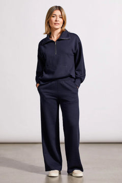 Savor the casual comfort these quilted knit pants bring to your wardrobe. The wide-leg design is accented by a stretchy pull-on waist, a 29" inseam, and practical slant pockets. Better yet, we've styled them with a coordinated top counterpart to give you a cohesive style with minimal effort.