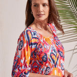 Channel cheerful vibes all day long in this peasant top crafted from printed linen-blend fabric.