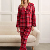 You'll be sleeping like royalty in this two-piece pajama set made from super soft flannel fabric showcasing a plaid pattern. 