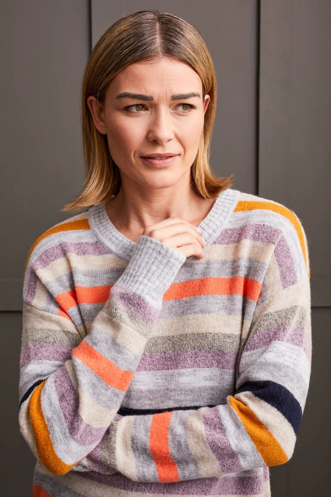 
Slip into this crew neck sweater, expertly crafted from sumptuously soft yarn, and you'll immediately understand why it's a perennial favorite. With long drop-shoulder sleeves lending a touch of casual elegance, vibrant multicolor stripes infuse it with undeniable charm. Finished with ribbed detailing at the neck, cuffs, and hem, it exudes a refined yet relaxed style.