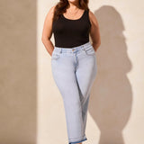 Move through your day with ease in these comfortable stretch Sophia curvy denim jeans. Designed with a classic mid-rise fit and a micro flare leg, they add a touch of retro charm to your look, while the tummy tuck feature offers flattering shaping at the waist for a smooth silhouette.