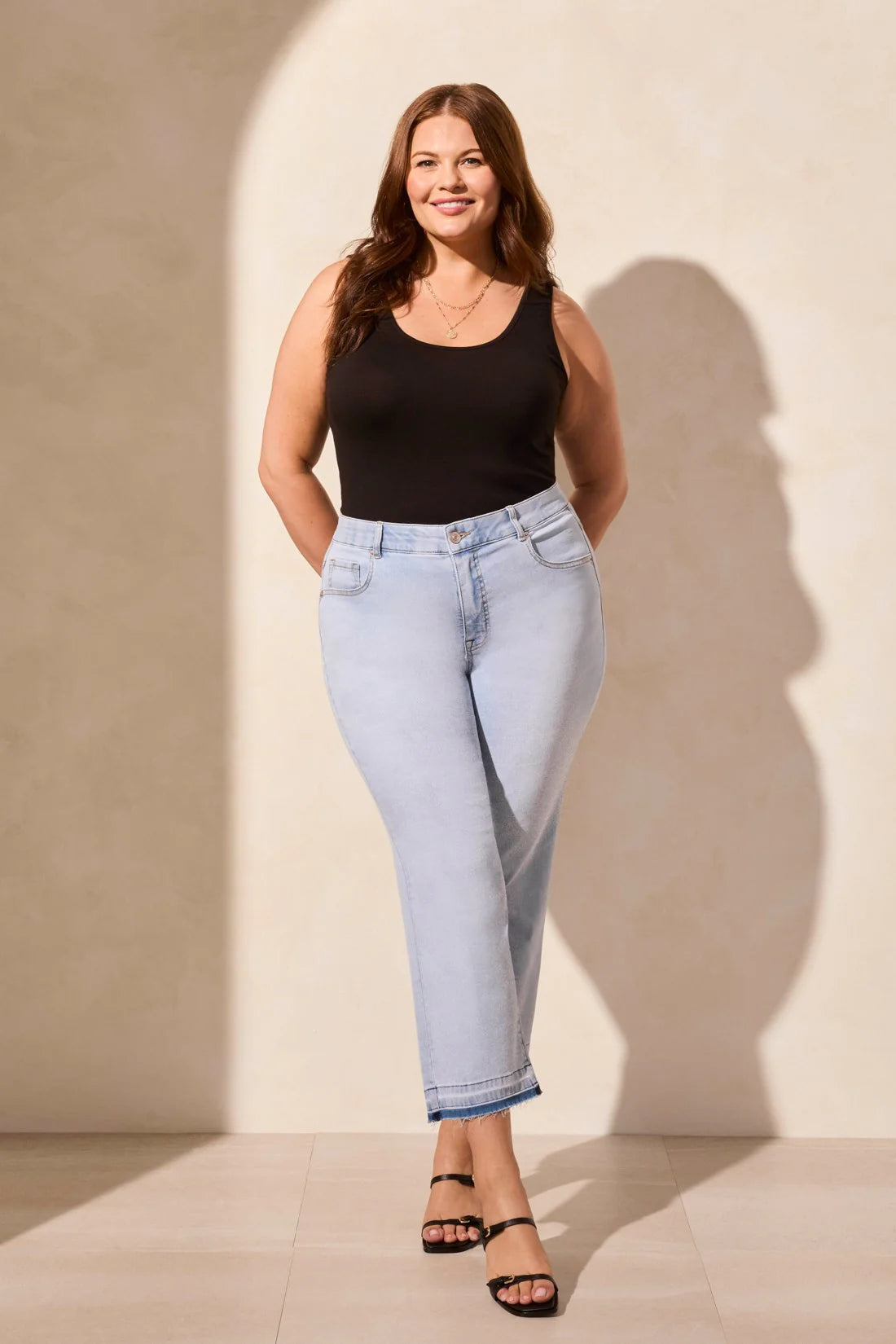 Move through your day with ease in these comfortable stretch Sophia curvy denim jeans. Designed with a classic mid-rise fit and a micro flare leg, they add a touch of retro charm to your look, while the tummy tuck feature offers flattering shaping at the waist for a smooth silhouette.