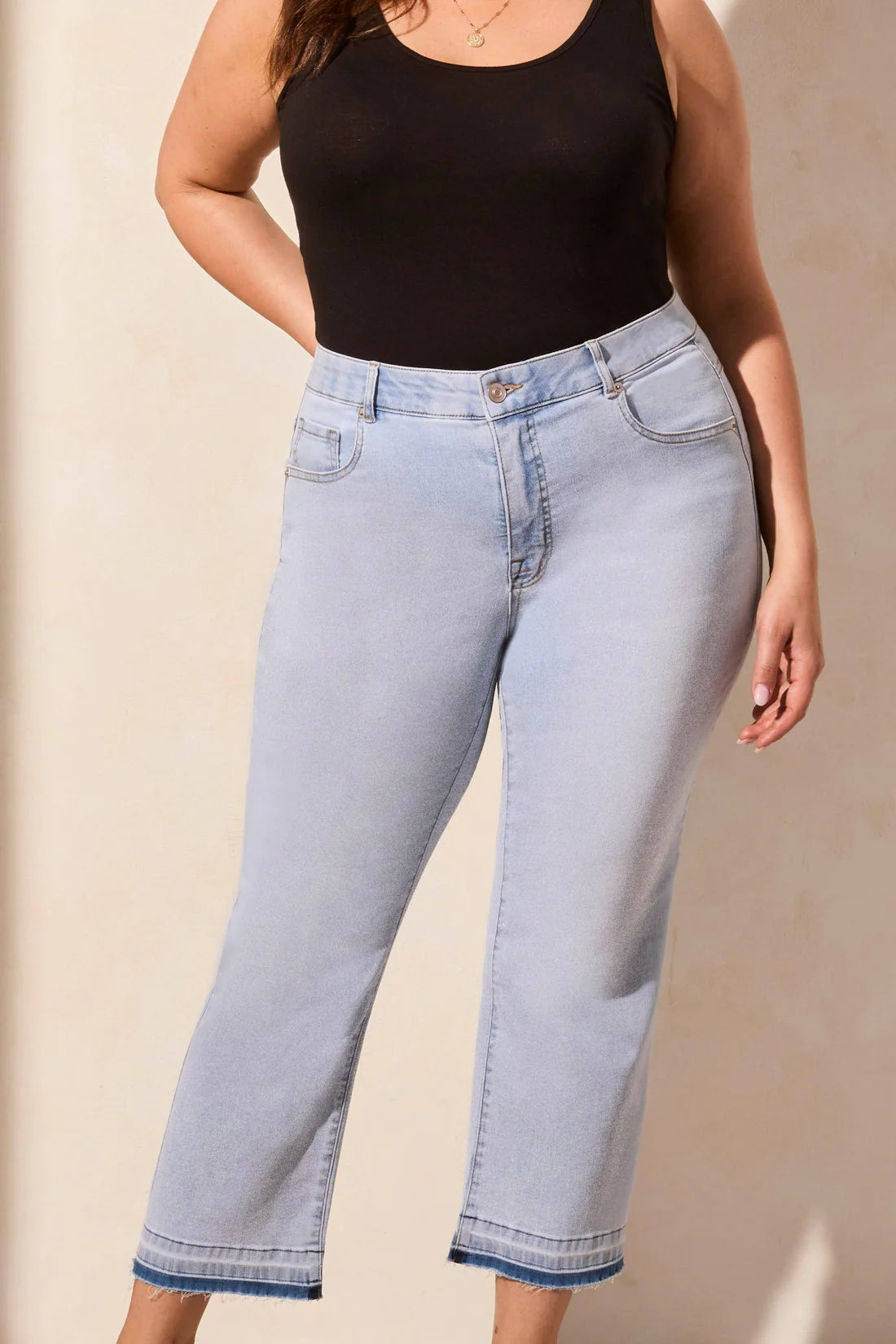 Move through your day with ease in these comfortable stretch Sophia curvy denim jeans. Designed with a classic mid-rise fit and a micro flare leg, they add a touch of retro charm to your look, while the tummy tuck feature offers flattering shaping at the waist for a smooth silhouette.