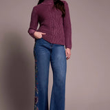 Indulge in cozy comfort with this warm sweater featuring a mock neckline and long sleeves for full coverage. Crafted from soft cotton yarn and finished with a vintage wash, it exudes timeless charm. The loose fit and drop shoulder create a relaxed silhouette, making it perfect for effortless, laid-back style.